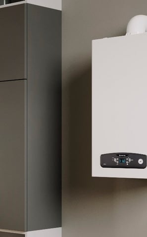 a white boilerer with a white tankless water heater