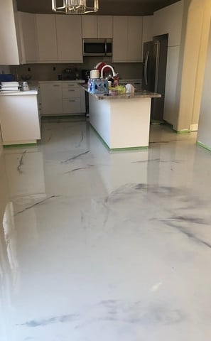 Epoxy Marbel floor in Grand Island home- white and grey pigments