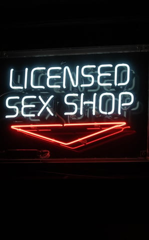 image with text reading licensed sex shop