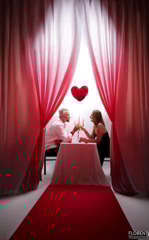 florent photographe saint omer lille a man and woman sitting at a table with a heart shaped balloon