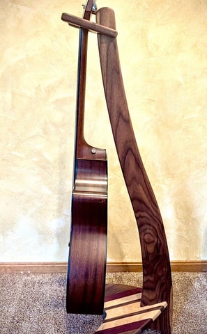 One-of-a-kind knock-down guitar stand made from black walnut, maple, and purple heart.