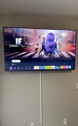 Basic TV installation with mount included and wire cover add on.
