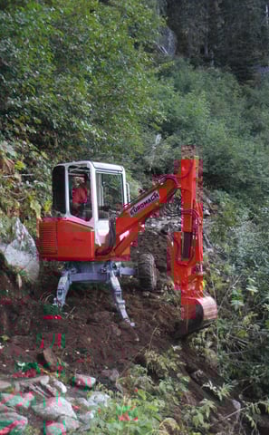 Backcountry trail building for BC parks using a compact spider excavator
