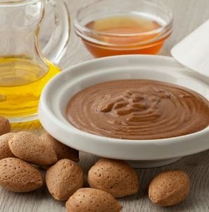 a bowl with nuts and almonds