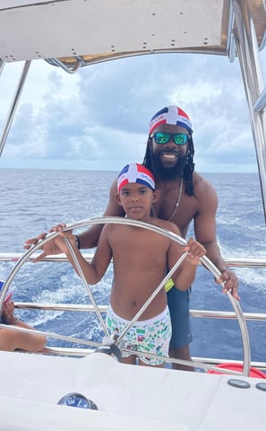 a man and a child on a boat