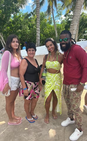 a group of people standing around a group of people