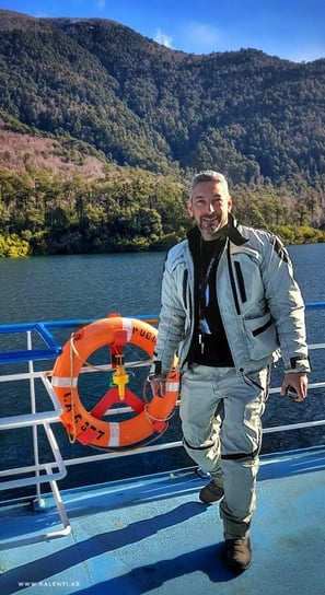 a man in a jacket and a life jacket
