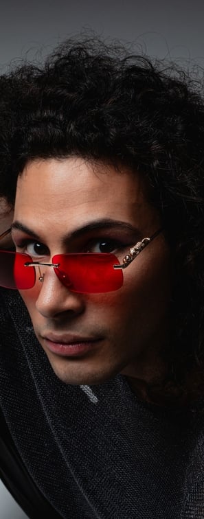 a drummer with red sunglasses