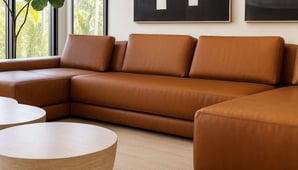 Tan leather sectional sofa with clean lines, by Solo Home Decor in a modern space.