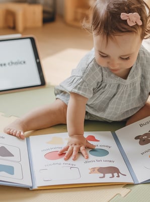 Toddler on Busy book
