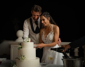 Bride and Groom cutting the Wedding Cake at Praia D'El Rey Marriott Golf & Beach Resort
