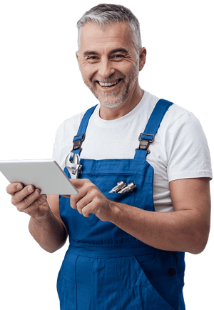 a man in overalls and overalls holding a tablet computer