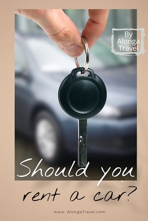 a hand holding a car key in front of a rental car & a sign that says 'Should you rent a car?' 