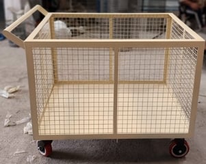 Wire mesh trolley has sheet in downside