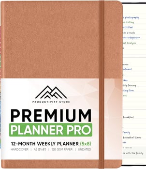 a notebook with a planner and planner book