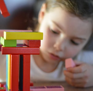 kid with blocks