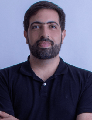 a man with a beard and a beard, wearing a black shirt