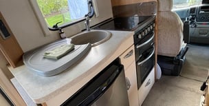 Showing the cooker and sink inside Skye