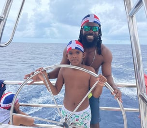 a man and a child on a boat