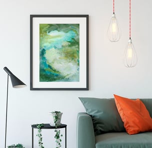 a wonderful green painting called "another earth" above a couch