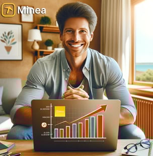 a man sitting at a table with a laptop and a laptop