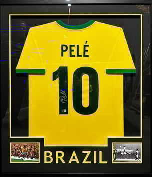 Signed Pele jersey with two 8x10 photos