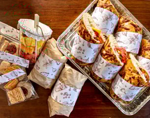 a tray of food and snacks on a table