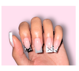 a person's hand with a manicured new acrylic set with bling nailmanicured manicured mani