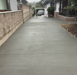 freshly laid concrete for a new driveway