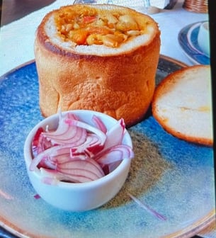 Bean soup served in bread, Romania
