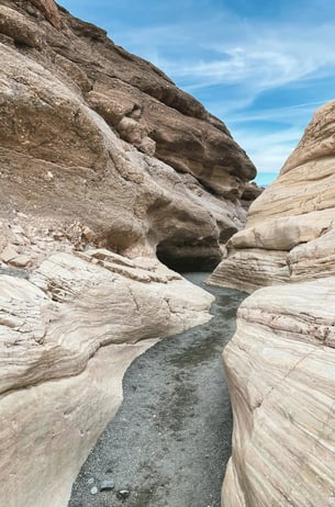 Death Valley, CA - Unexpected rains in the desert create a flash flood thru desert canyons