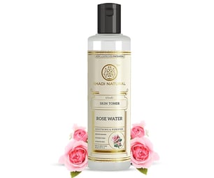 a bottle of water with pink roses and a bottle of water