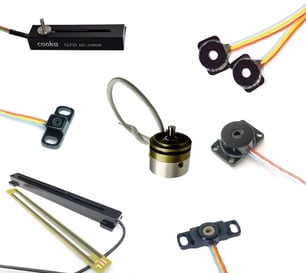 a collection of electronic components including a speaker and wires