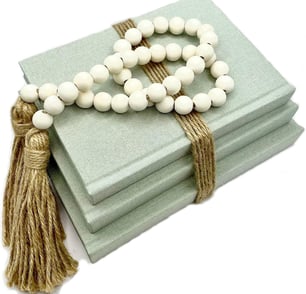 neutral colored home decor, book table decor