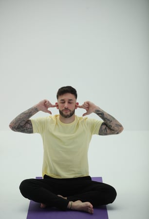 image of a man doing yoga 