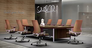 Conference room with tan leather swivel chairs and wooden table