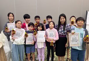 Thriving Kids Club Founder Mrs Serene Wee and students at English Bootcamp