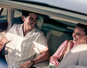 a man and woman in a car