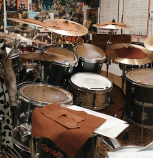 School black and brown drum sets