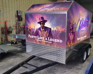 The SweetAz Co. trailer with the Pimp riding up front like the party legend he is, Party Like a Legend, Pimped by SweetAz Co.