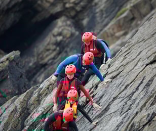 Engaged team navigating a challenge, sharing a unique experience