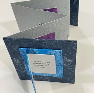 Accordion with Japanese paper and small book on cover - Bound Impressions