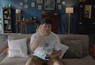 Big Basket, Cricket, Aditya Satyajit, One for Love, Ad, Man sitting on a couch  watching Cricket