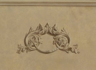 Ornementation, moulures et fausse pierre peintes dans cette grisaille en trompe-l'oeil
