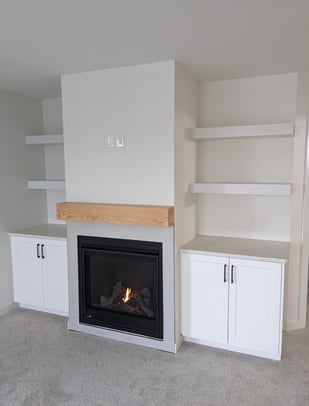 modern fireplace with free floating shelves and storage