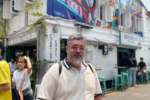 Image of Author: Jason A Ellis traveling the world, local area in Singapore
