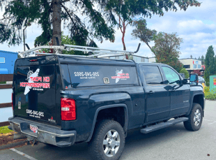 the truck company with a truck bed and a trailer