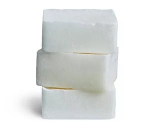 a stack of soap bars with soap and soap