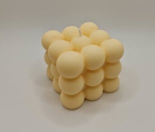 Candle molded in the shape of a 100% natural bubble with vanilla essential oils