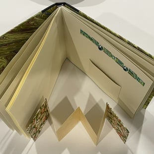 Album with marbled paper and decorative pages